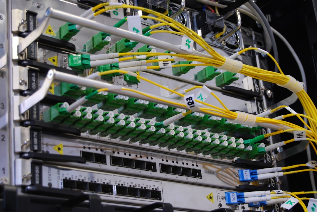 Fiber optic and telecommunications equipment in a network equipment rack