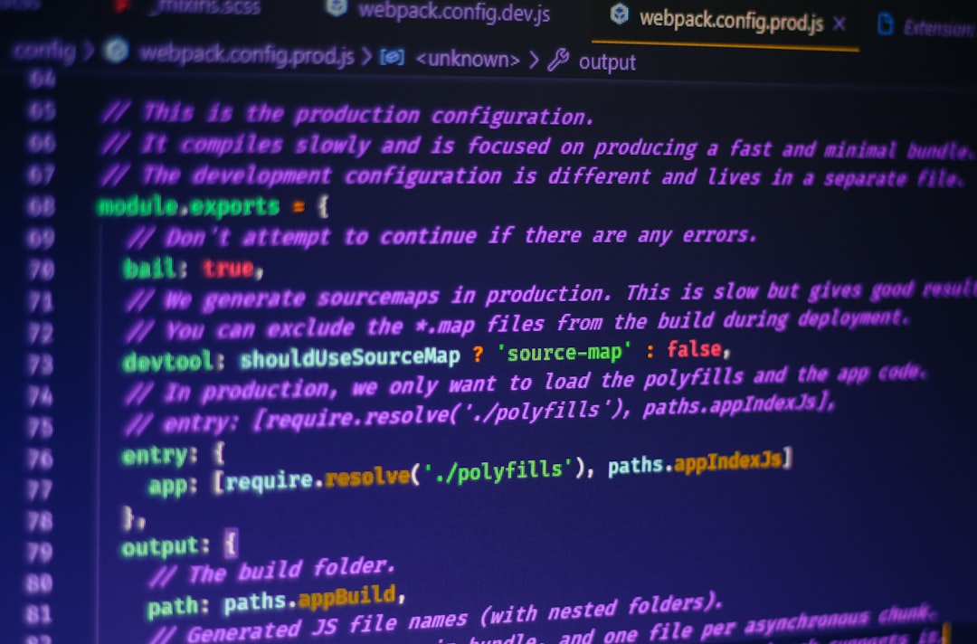 Software development workspace with code on screen