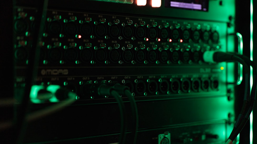 Server infrastructure with green indicator lights in a secure data center environment