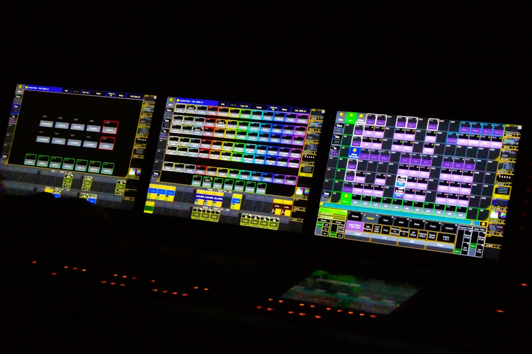 Control room monitors displaying data dashboards, representing human oversight and monitoring of enterprise AI agent operations