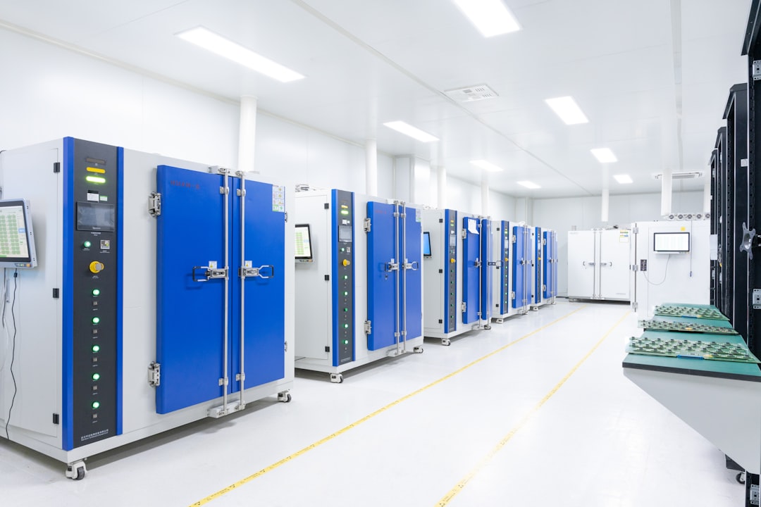 Rows of data center equipment in a clean, well-lit server room