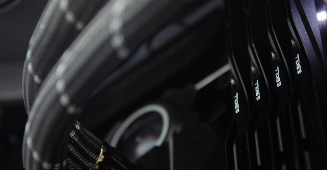 Close-up view of computer hardware with connected cables and components