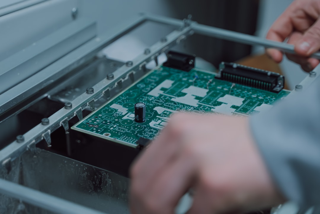 Close-up of a circuit board representing the structured technical foundation behind AI quality management systems